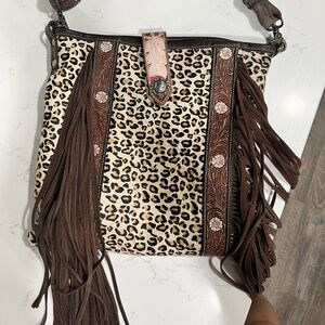 Myra fringe leopard bag